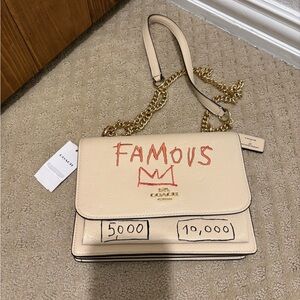 Coach Cream Leather Crossbody with Red 'FAMOUS' Graphic and Gold Chain